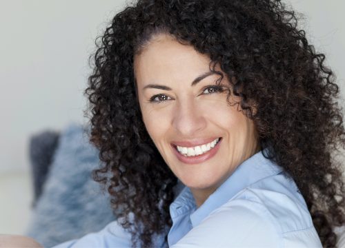 Happy woman after Bellafill treatments