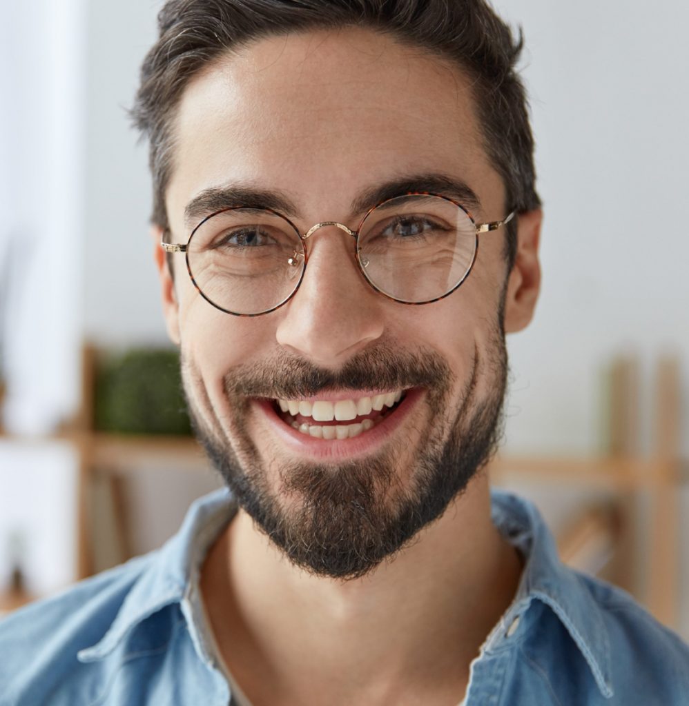 Man with glasses and a goatee
